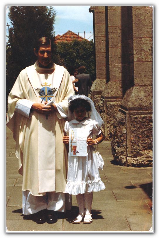 LJ and Priest at LJ Holy Communion